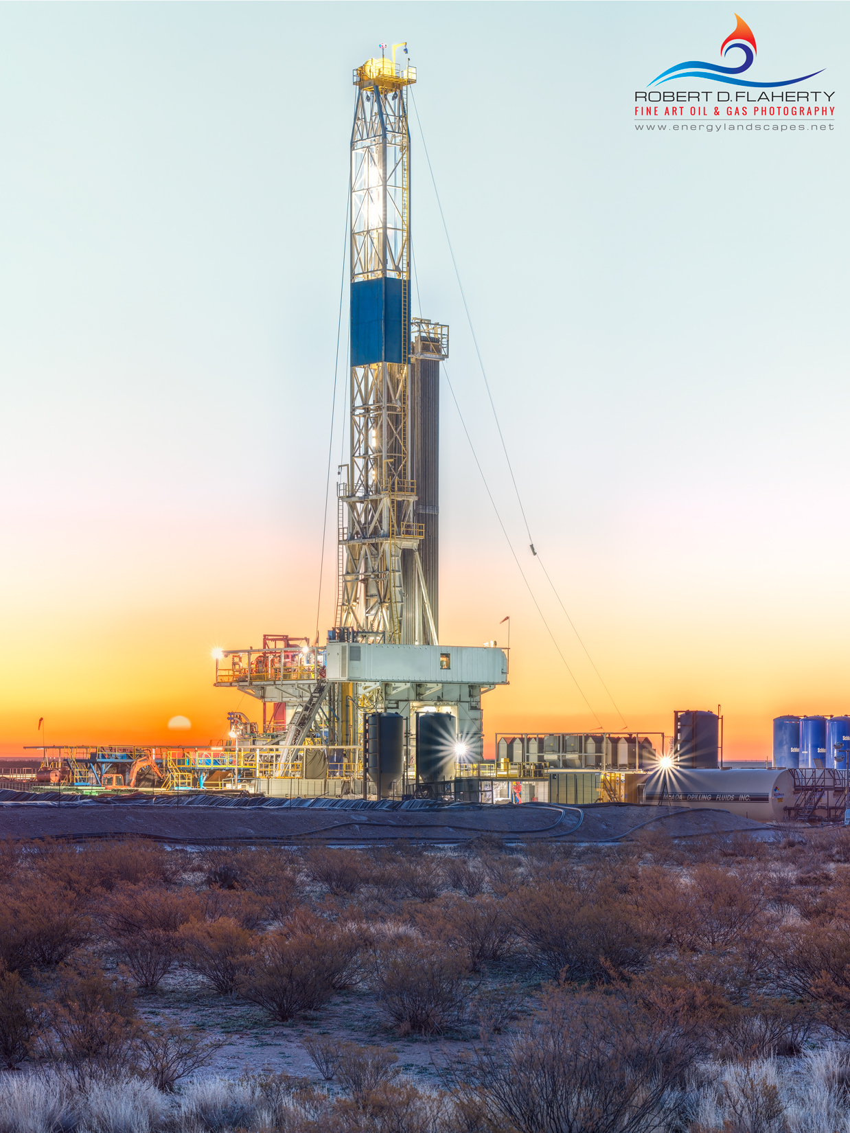 Dawning of a New Day features a Winter sunrise on a large Chevron pad drilling operation South of Pecos Texas. Winter stillness...