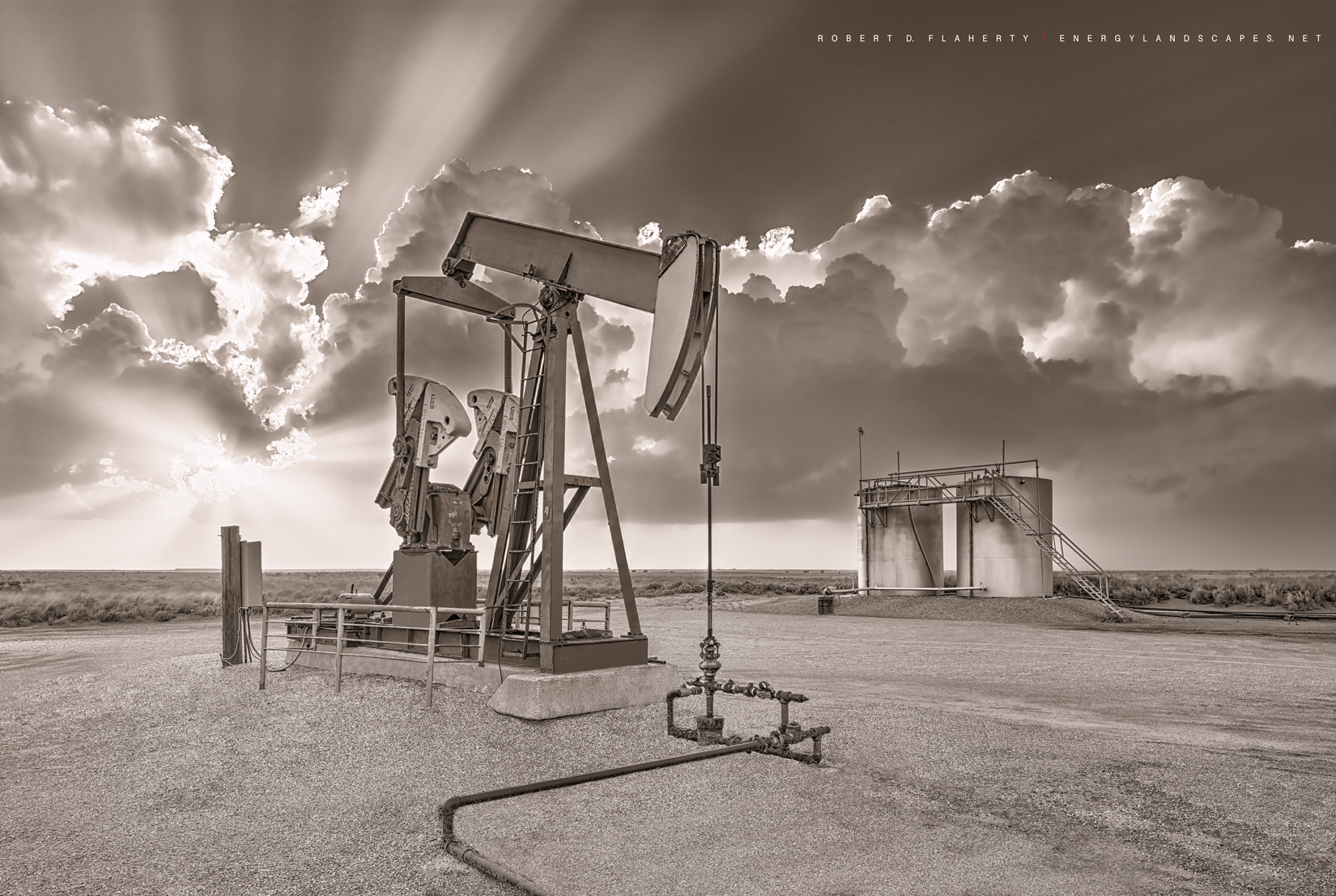 The Best Of Whats Around I Sepia features a pump jack and battery on an old stripper well on the open plains Northwest of Denver...