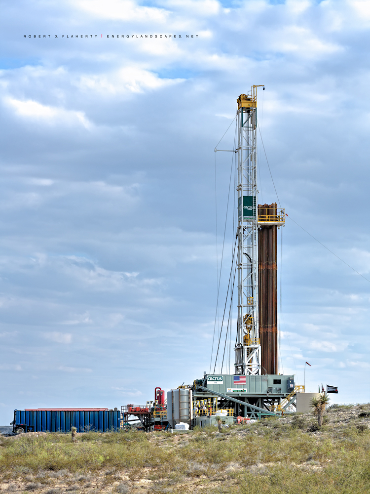 "Delaware Evening" is a vertical perspective featuring Cactus Rocket rig 148 drilling a lateral gas well in the moutains of Western...
